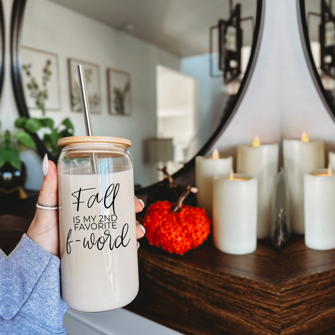 A stylish Fall F-Word Cup made of high borosilicate glass with a bamboo lid, featuring a black graphic text that reads 'FALL IS MY 2ND FAVORITE F-WORD', accompanied by stainless steel straws.