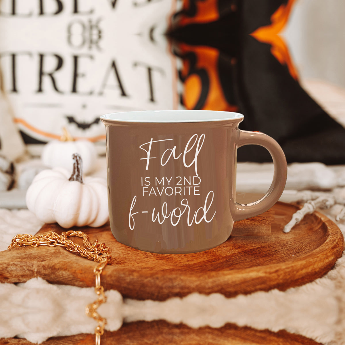 A stylish Fall + F-Word Mug featuring a neutral brown tone and white lettering, designed for cozy autumn beverages.