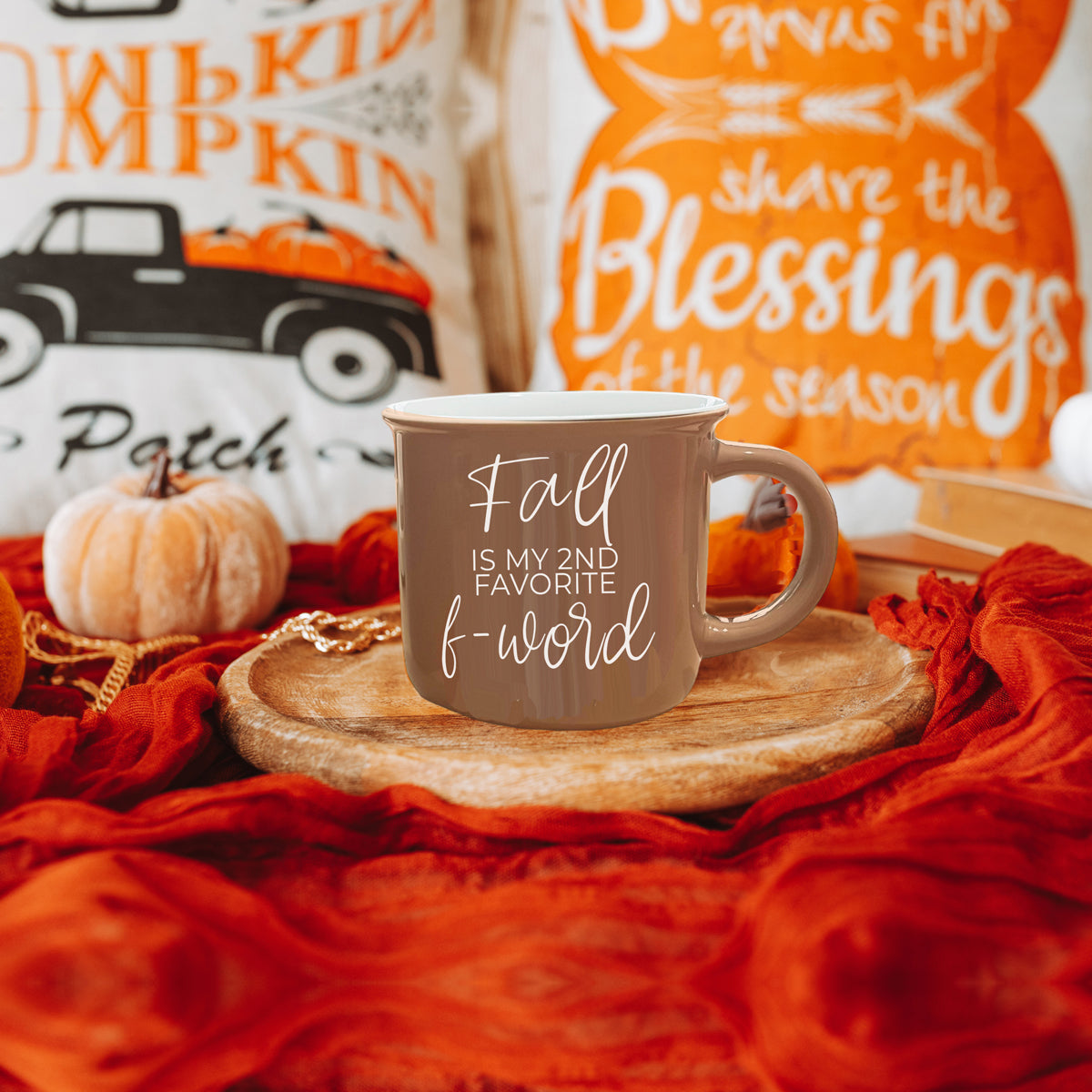 A stylish Fall + F-Word Mug featuring a neutral brown tone and white lettering, designed for cozy autumn beverages.