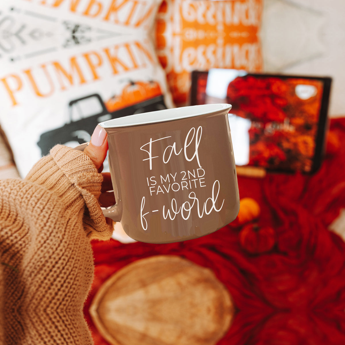 A stylish Fall + F-Word Mug featuring a neutral brown tone and white lettering, designed for cozy autumn beverages.