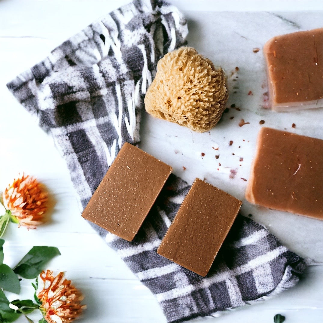 A handcrafted bar of Fall Pumpkin Spice soap featuring warm autumn colors and a rich, inviting fragrance, perfect for seasonal skincare.