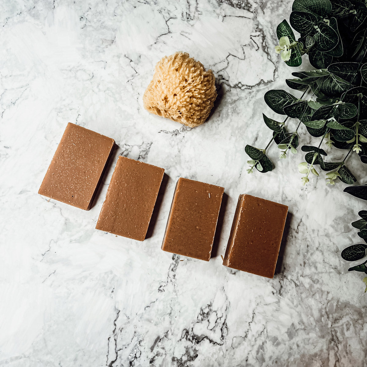 A handcrafted bar of Fall Pumpkin Spice soap featuring warm autumn colors and a rich, inviting fragrance, perfect for seasonal skincare.