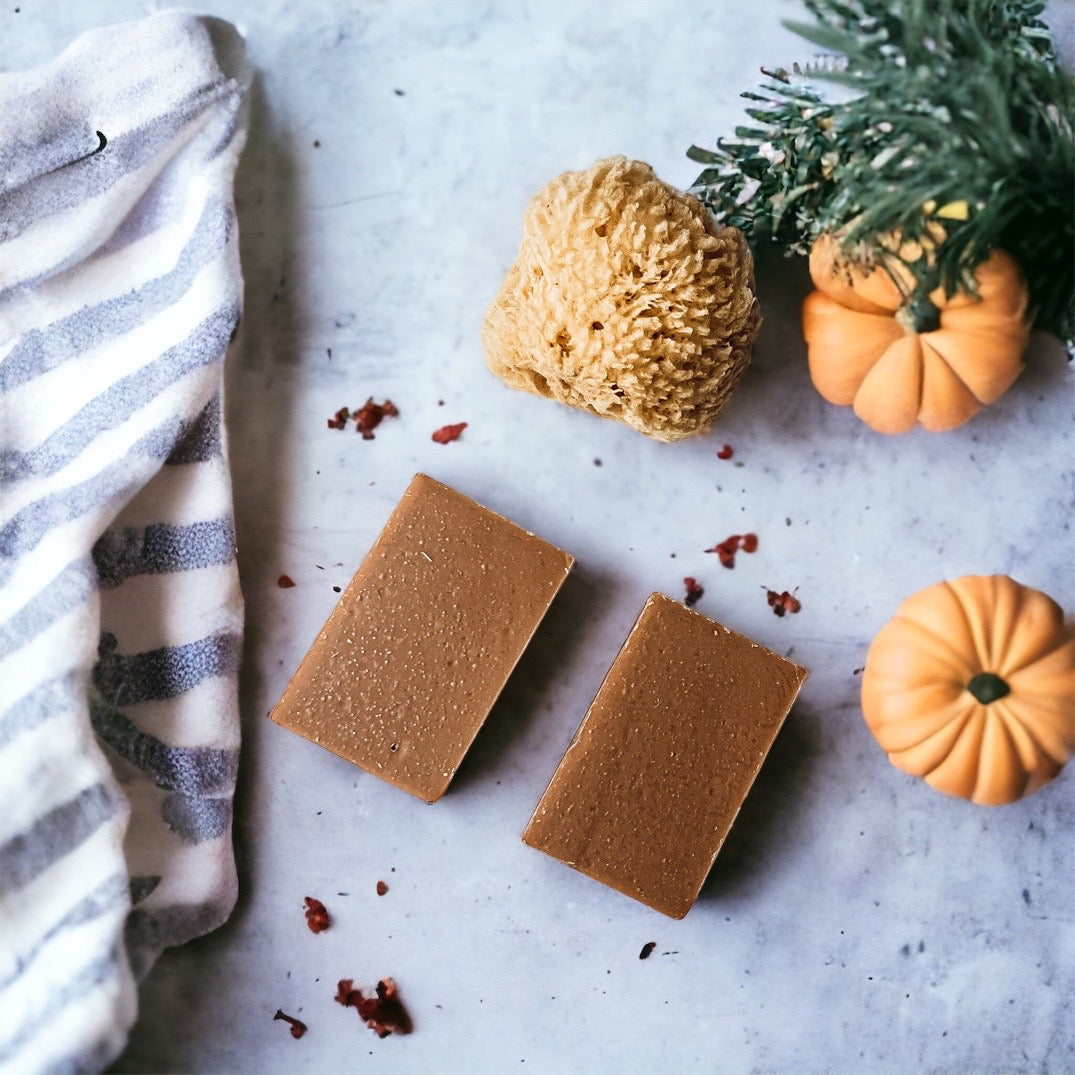 A handcrafted bar of Fall Pumpkin Spice soap featuring warm autumn colors and a rich, inviting fragrance, perfect for seasonal skincare.