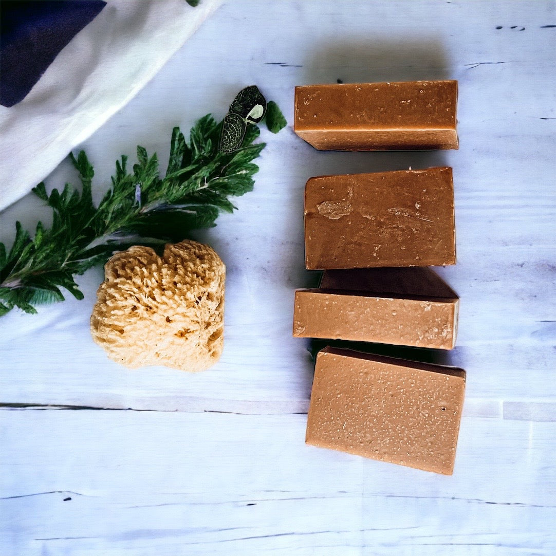 A handcrafted bar of Fall Pumpkin Spice soap featuring warm autumn colors and a rich, inviting fragrance, perfect for seasonal skincare.