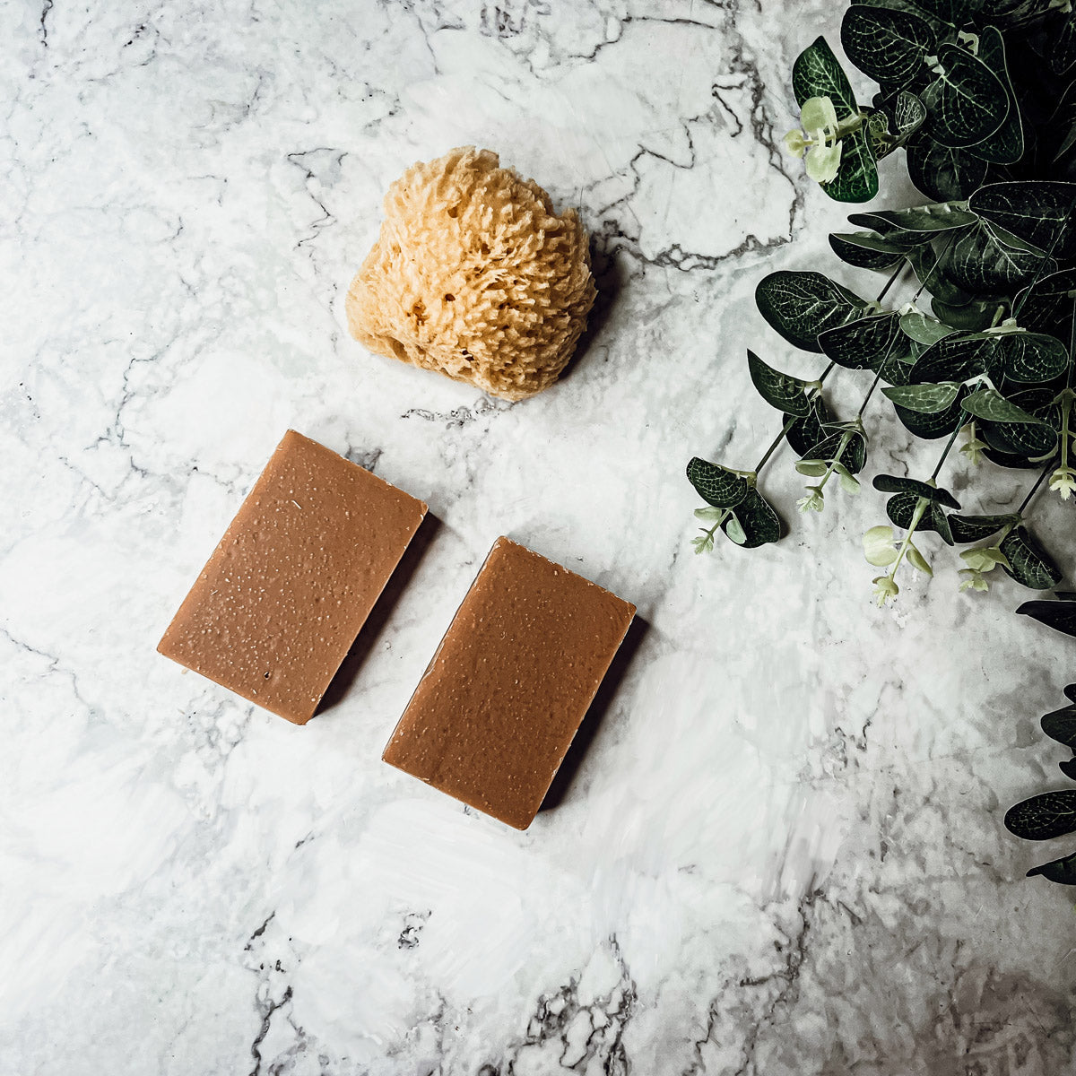 A handcrafted bar of Fall Pumpkin Spice soap featuring warm autumn colors and a rich, inviting fragrance, perfect for seasonal skincare.