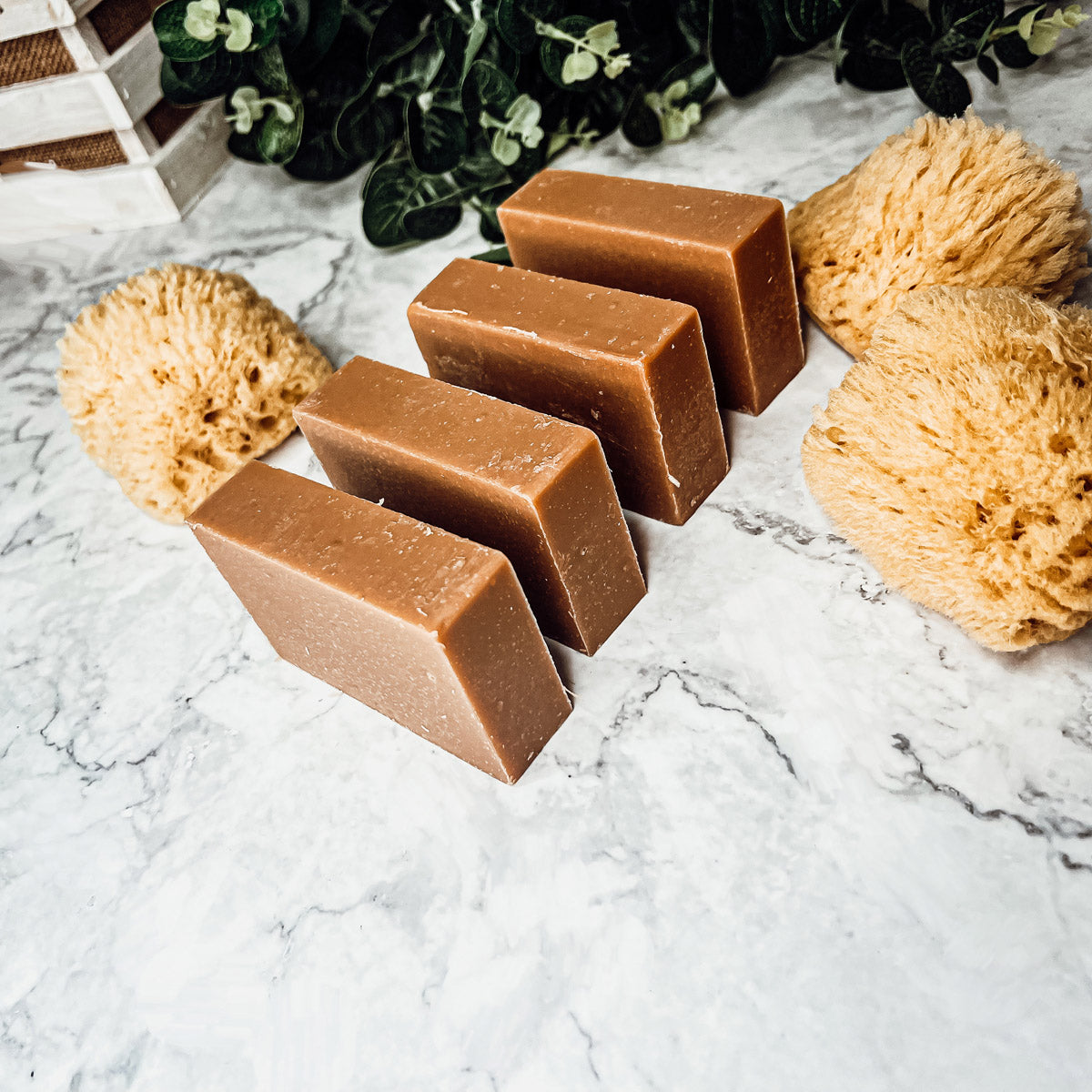 A handcrafted bar of Fall Pumpkin Spice soap featuring warm autumn colors and a rich, inviting fragrance, perfect for seasonal skincare.