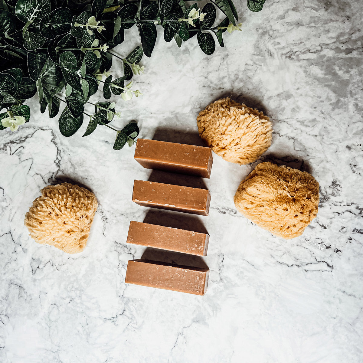 A handcrafted bar of Fall Pumpkin Spice soap featuring warm autumn colors and a rich, inviting fragrance, perfect for seasonal skincare.