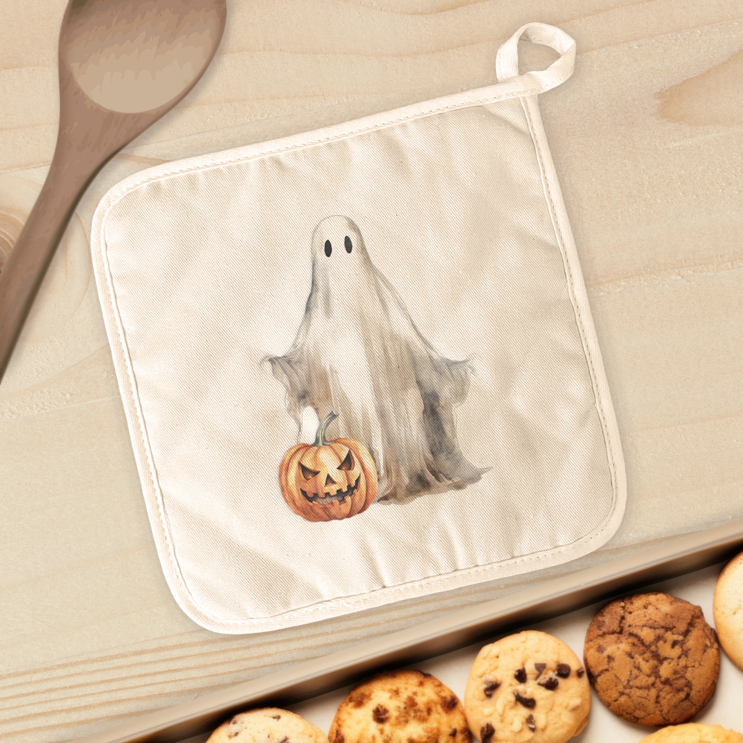 Ghost and Pumpkin cotton pot holder featuring a festive design with vibrant colors, perfect for protecting surfaces from hot cookware.