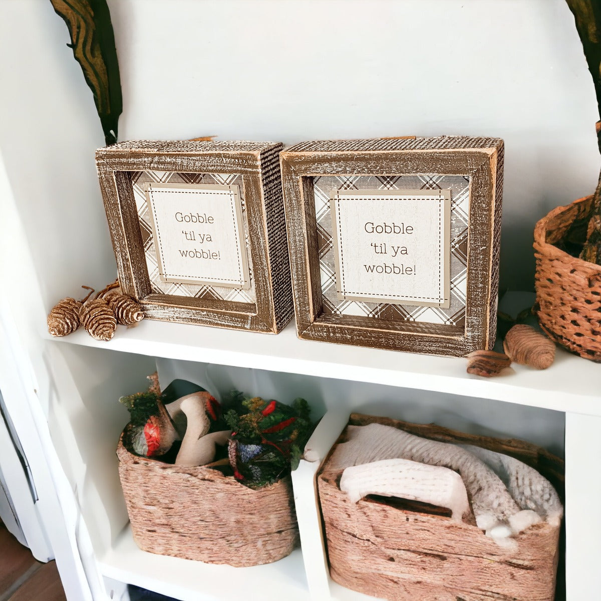 A charming Gobble Til Ya Wobble sign, perfect for Thanksgiving decor, featuring playful lettering on a compact wooden base.