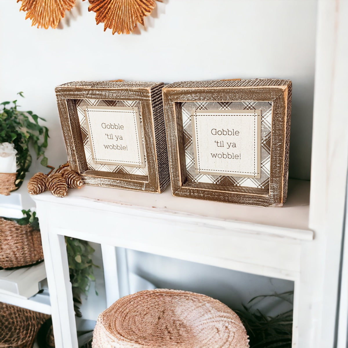 A charming Gobble Til Ya Wobble sign, perfect for Thanksgiving decor, featuring playful lettering on a compact wooden base.