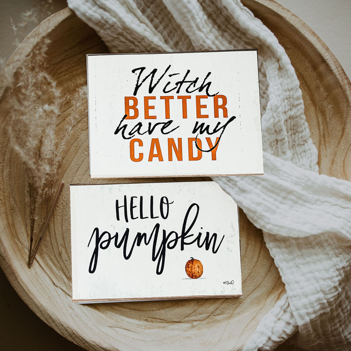 Hello Pumpkin wooden sign with rustic off-white background and black script, perfect for fall decor.