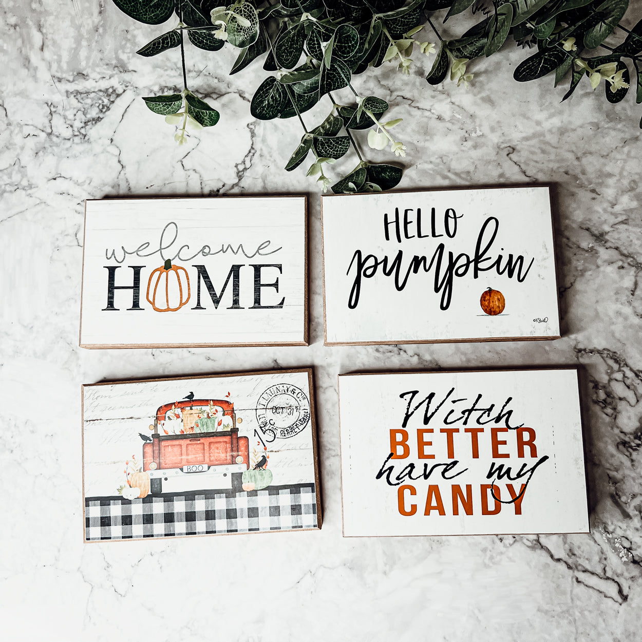 Hello Pumpkin wooden sign with rustic off-white background and black script, perfect for fall decor.