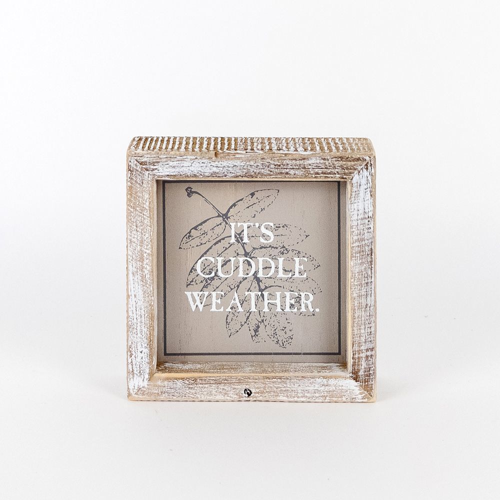 A double-sided wooden sign featuring 'Hey Boo' on one side and 'It's Cuddle Weather' on the other, measuring 5x5 inches.