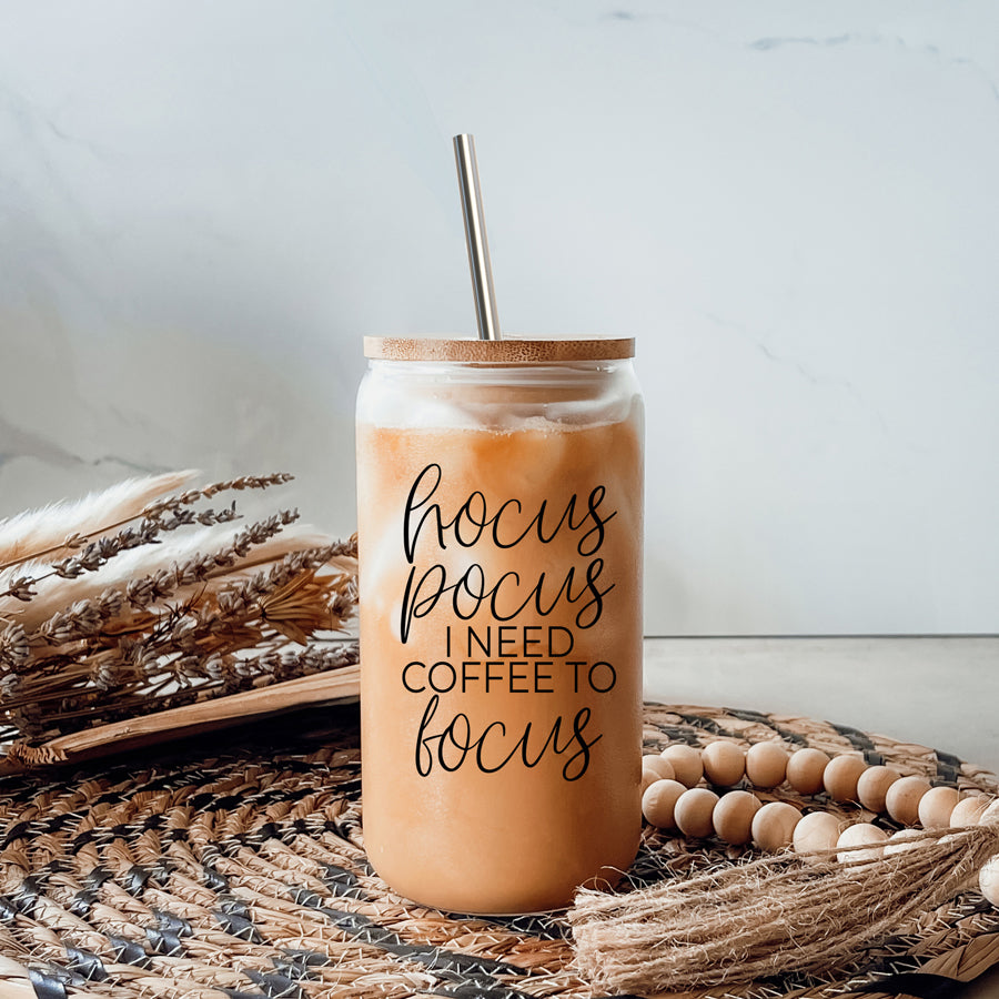 Hocus Pocus Cup with bamboo lid and stainless steel straws, featuring a black graphic design, ideal for hot and cold beverages.