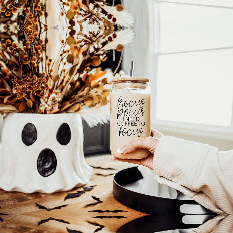 Hocus Pocus Cup with bamboo lid and stainless steel straws, featuring a black graphic design, ideal for hot and cold beverages.