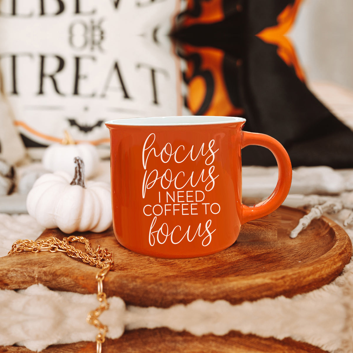 Hocus Pocus Mug in vibrant orange with white lettering, featuring the phrase 'Hocus Pocus I need Coffee to Focus!' on both sides, perfect for fall.