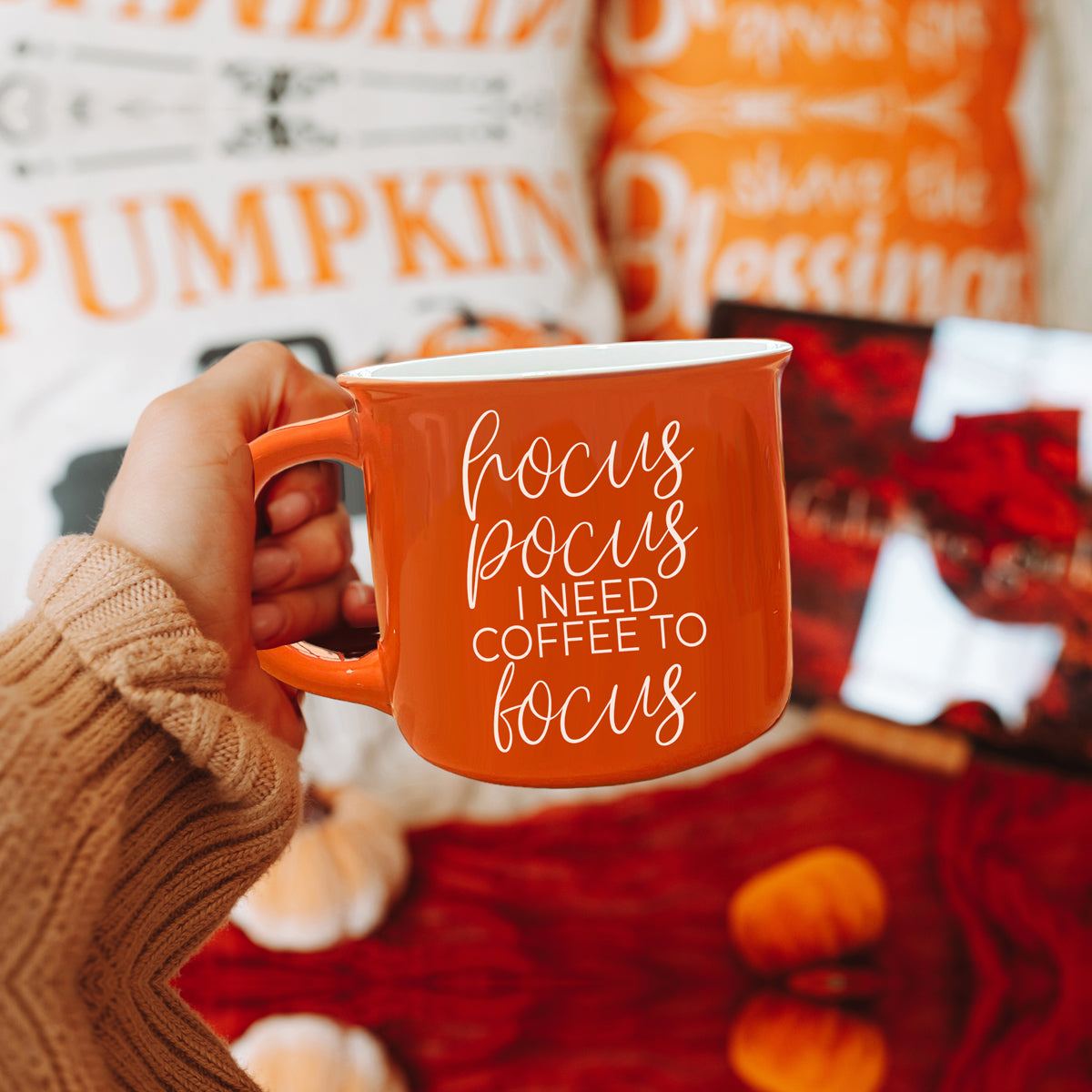 Hocus Pocus Mug in vibrant orange with white lettering, featuring the phrase 'Hocus Pocus I need Coffee to Focus!' on both sides, perfect for fall.