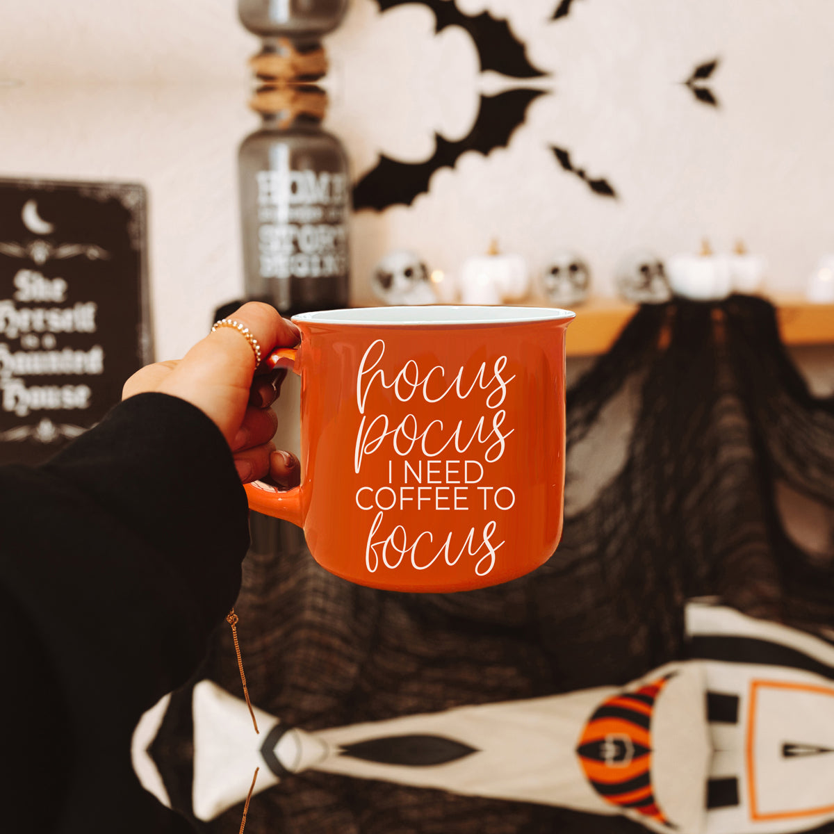 Hocus Pocus Mug in vibrant orange with white lettering, featuring the phrase 'Hocus Pocus I need Coffee to Focus!' on both sides, perfect for fall.