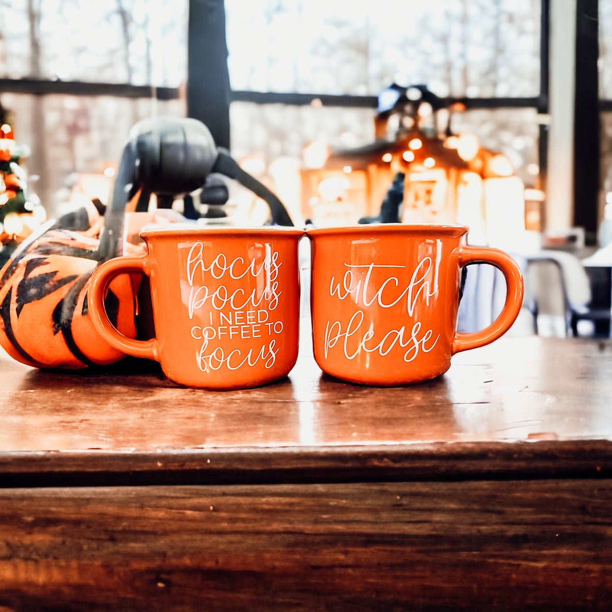 Hocus Pocus Mug in vibrant orange with white lettering, featuring the phrase 'Hocus Pocus I need Coffee to Focus!' on both sides, perfect for fall.