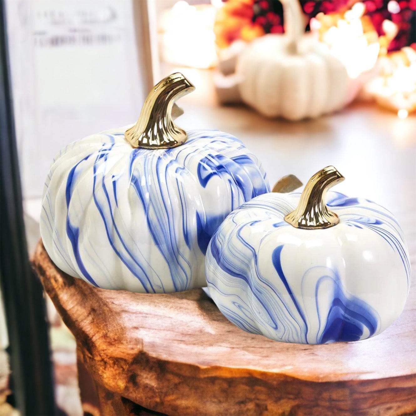 A stunning marbled blue pumpkin, handcrafted from dolomite, showcasing unique designs and elegant curves, perfect for Halloween decor.