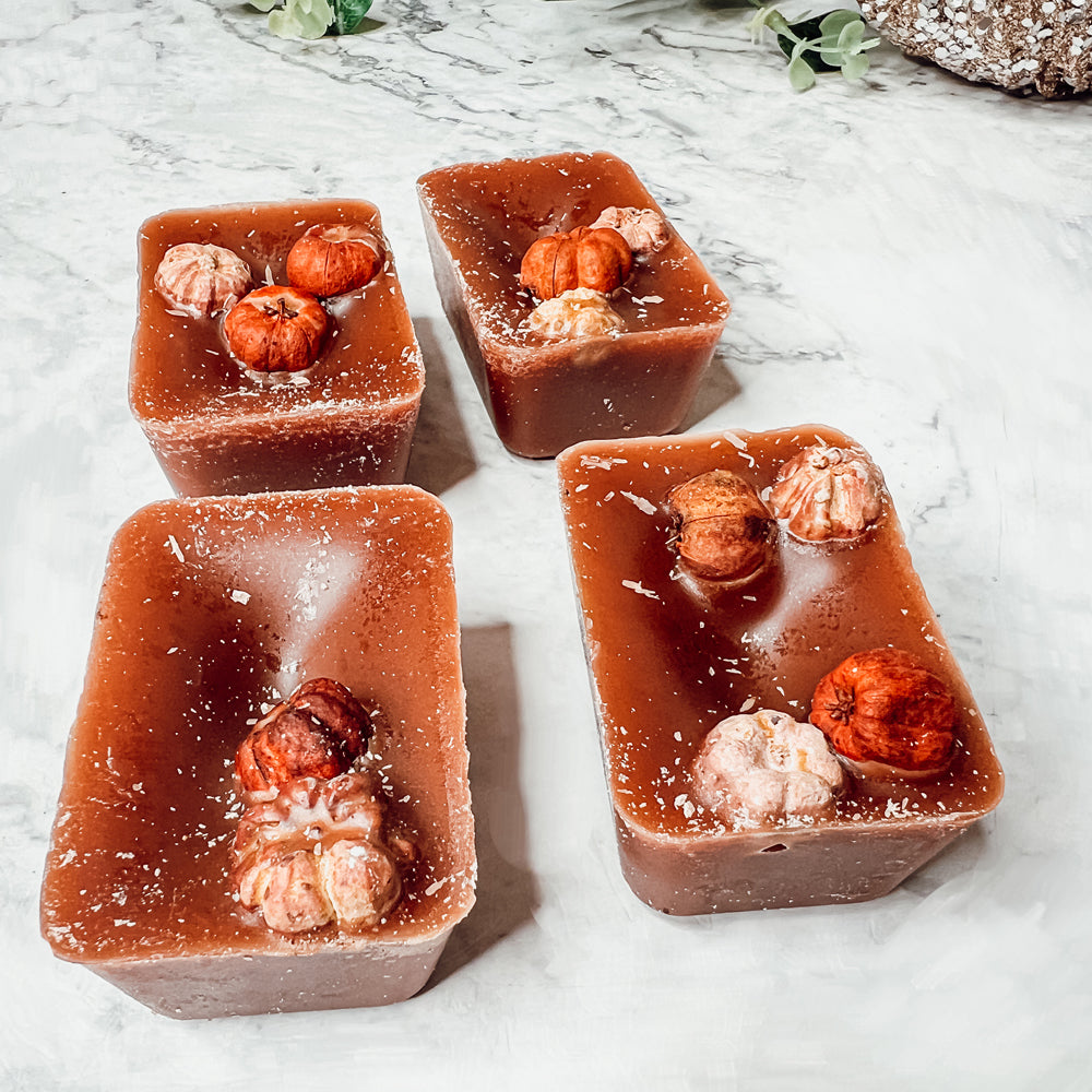 A close-up of Pumpkin Pecan Waffles wax melts, showcasing their rich color and texture, with a warm, inviting scent of autumn.