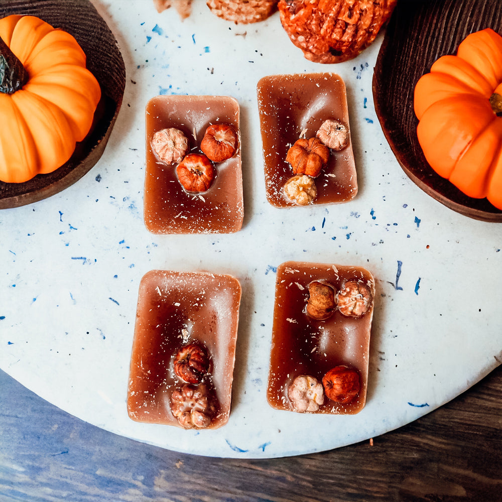 A close-up of Pumpkin Pecan Waffles wax melts, showcasing their rich color and texture, with a warm, inviting scent of autumn.