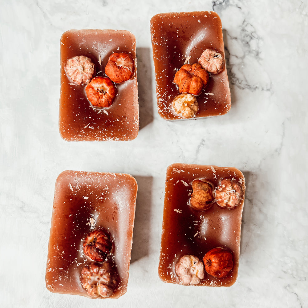 A close-up of Pumpkin Pecan Waffles wax melts, showcasing their rich color and texture, with a warm, inviting scent of autumn.