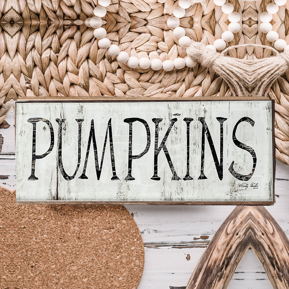 Rustic wooden pumpkins with a wood-like appearance, perfect for fall and Halloween decor.