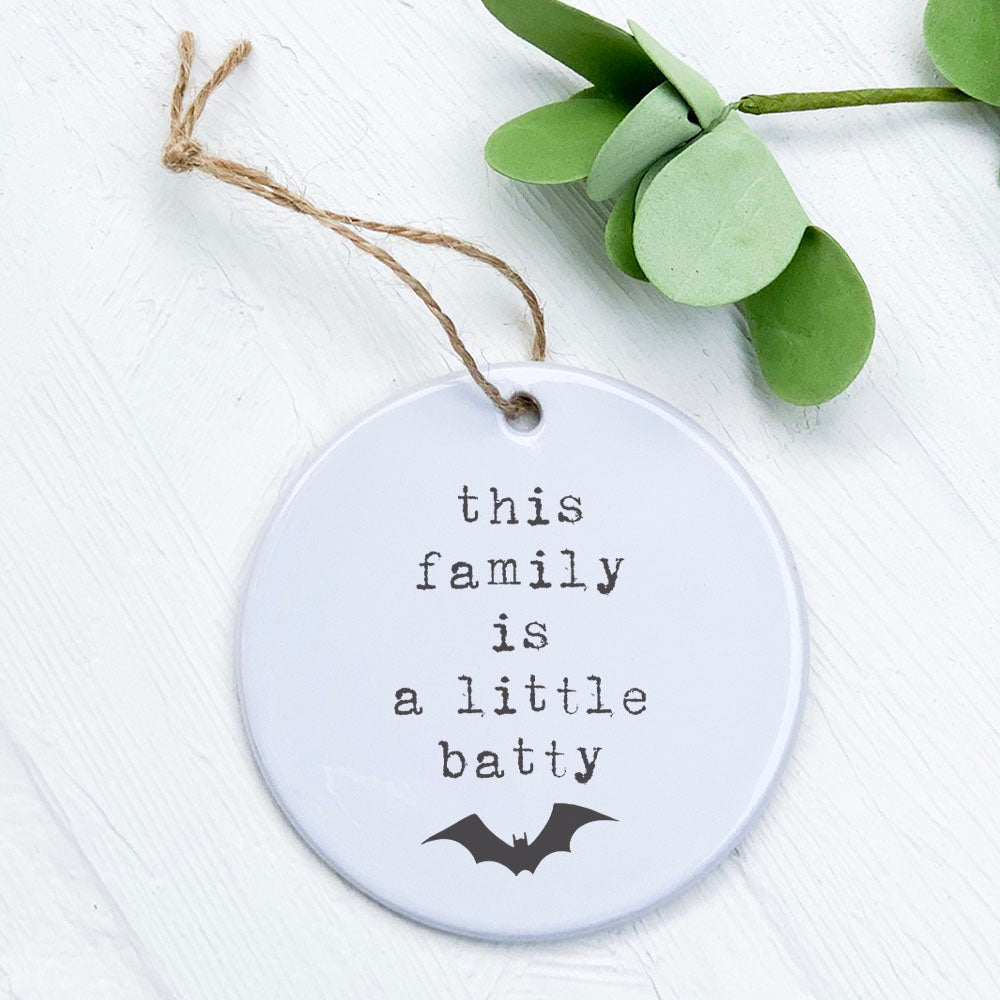 Porcelain ornament featuring a whimsical batty family design, perfect for holiday decor.