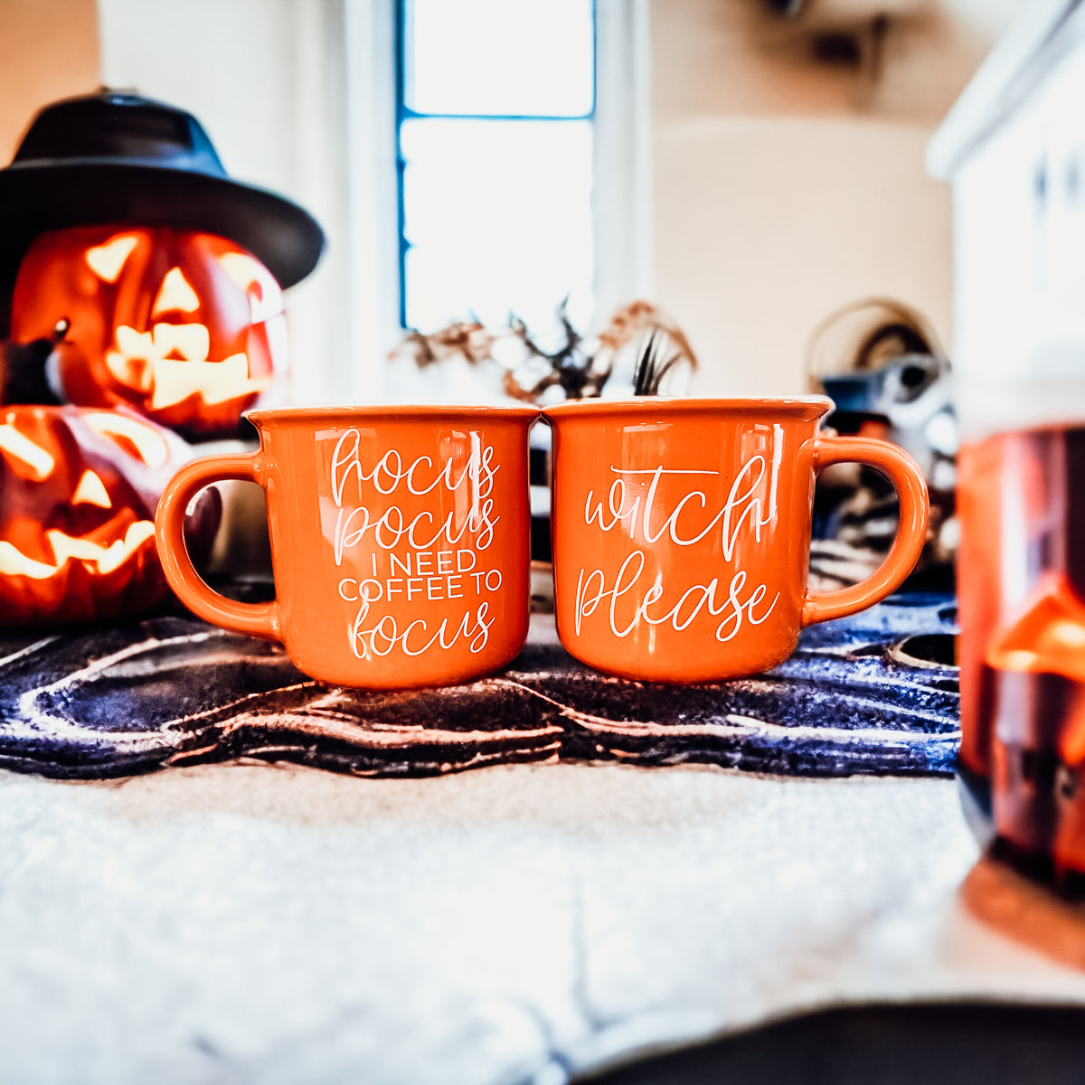 Witch Please Mug in vibrant orange with white lettering, featuring a whimsical design on both sides, perfect for fall beverages.