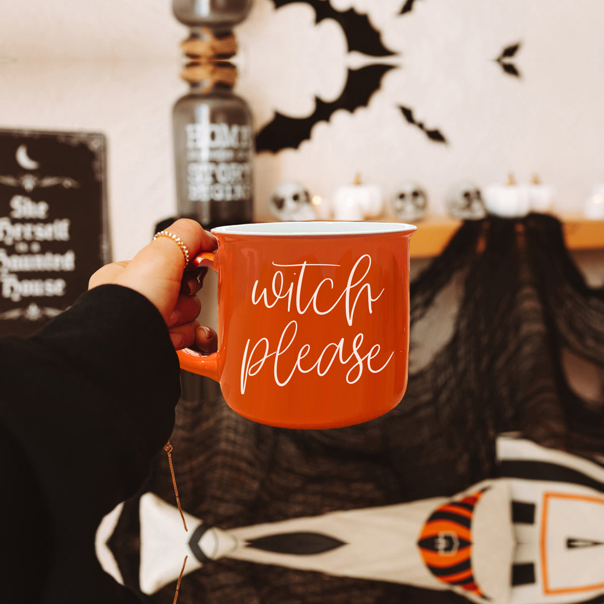 Witch Please Mug in vibrant orange with white lettering, featuring a whimsical design on both sides, perfect for fall beverages.