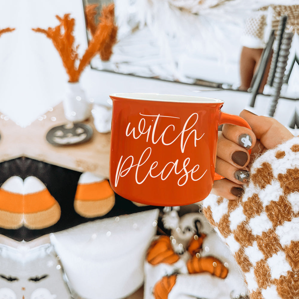 Witch Please Mug in vibrant orange with white lettering, featuring a whimsical design on both sides, perfect for fall beverages.