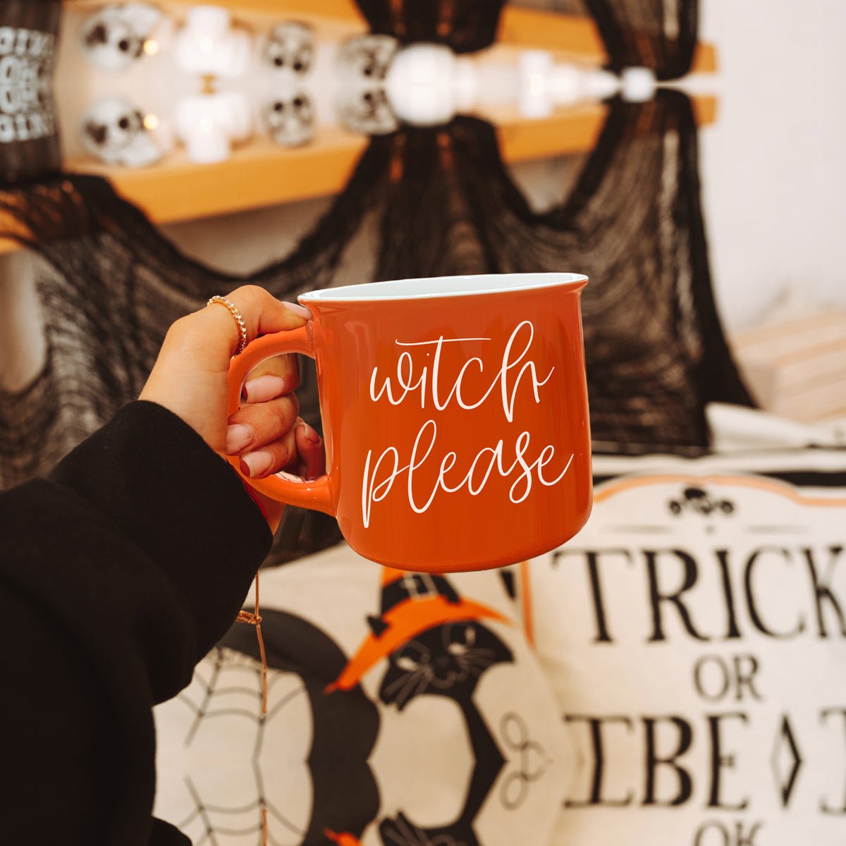 Witch Please Mug in vibrant orange with white lettering, featuring a whimsical design on both sides, perfect for fall beverages.