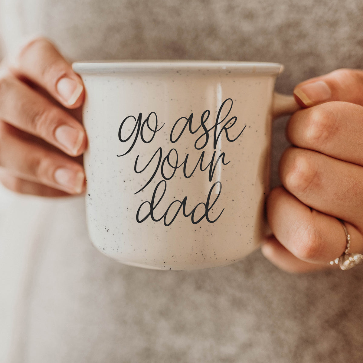 Go Ask Your Dad Ceramic Coffee Mug with light ivory glaze and black lettering, featuring a campfire style design, perfect for busy parents.