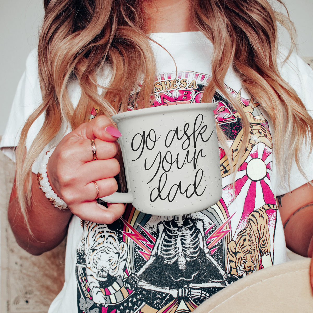 Go Ask Your Dad Ceramic Coffee Mug with light ivory glaze and black lettering, featuring a campfire style design, perfect for busy parents.