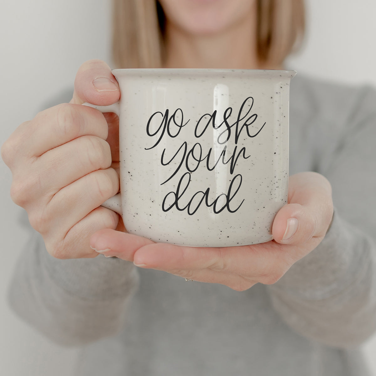 Go Ask Your Dad Ceramic Coffee Mug with light ivory glaze and black lettering, featuring a campfire style design, perfect for busy parents.