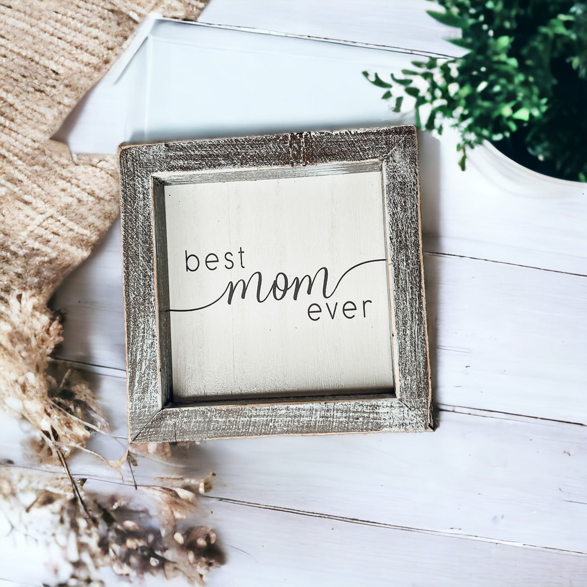 A rustic wooden framed sign displaying the quote 'Best Mom Ever', measuring 5x5x1.5 inches, perfect for home decor.