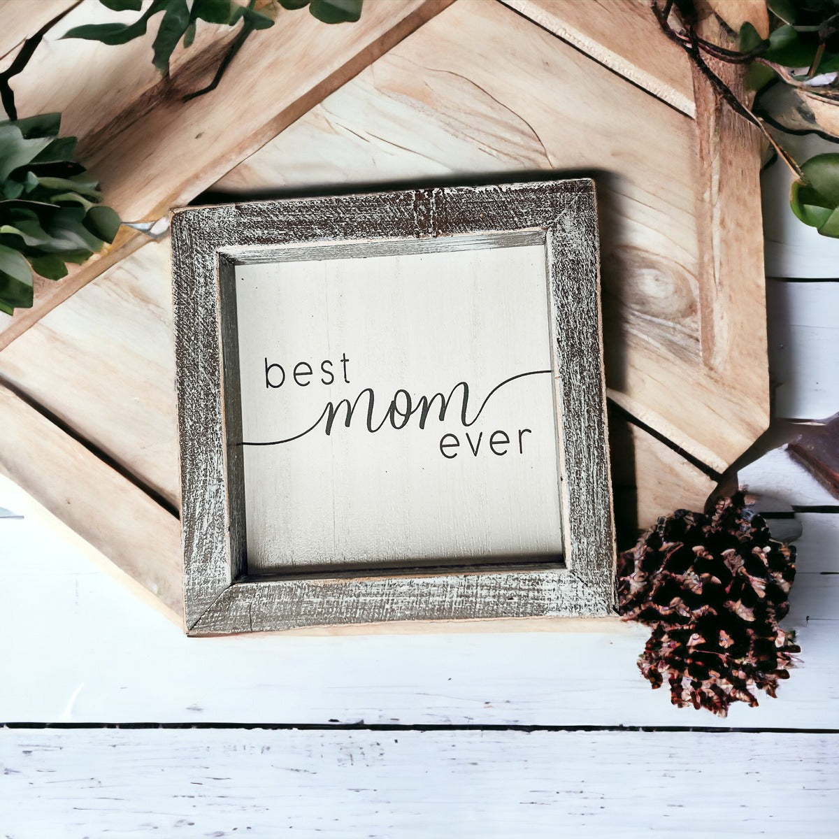 A rustic wooden framed sign displaying the quote 'Best Mom Ever', measuring 5x5x1.5 inches, perfect for home decor.