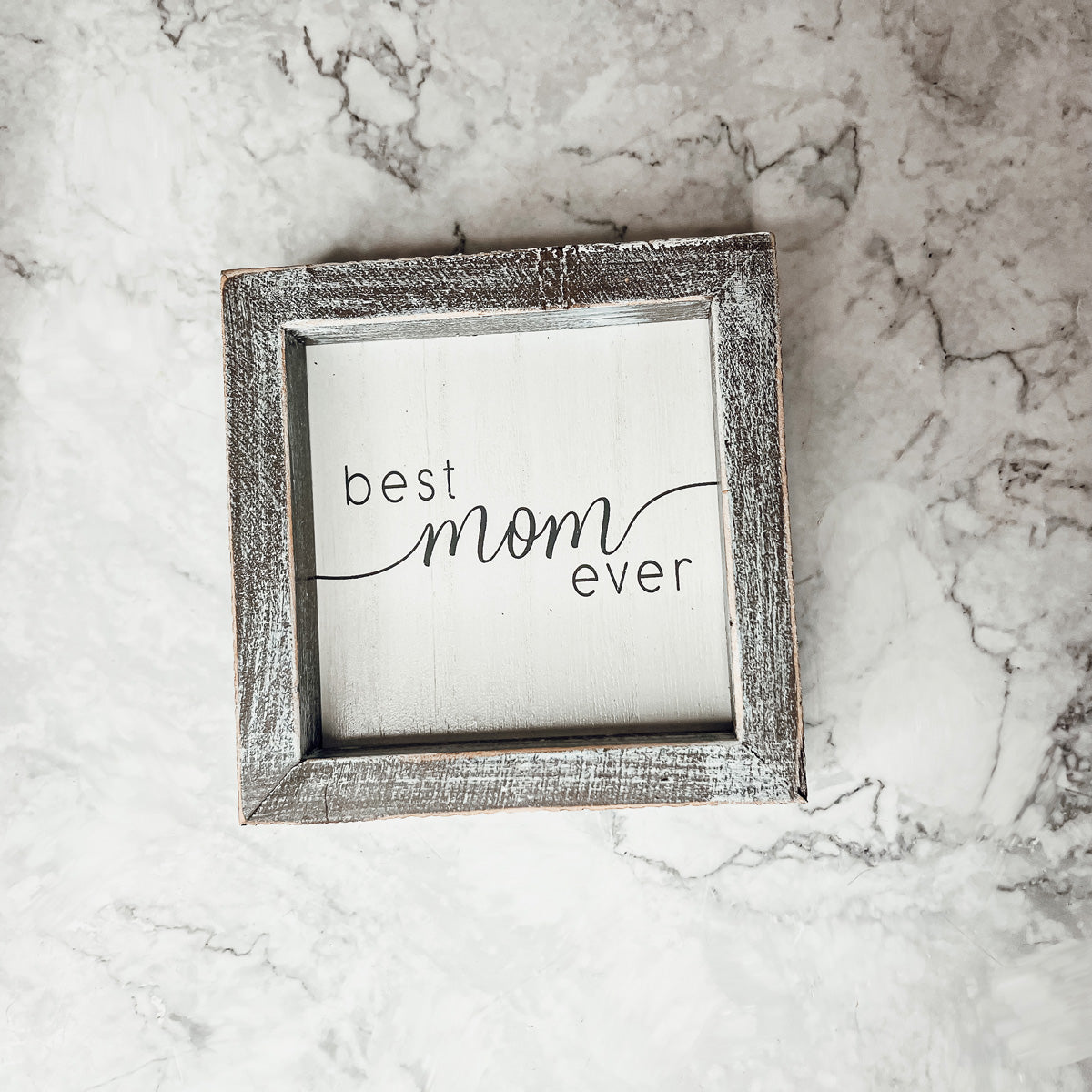 A rustic wooden framed sign displaying the quote 'Best Mom Ever', measuring 5x5x1.5 inches, perfect for home decor.