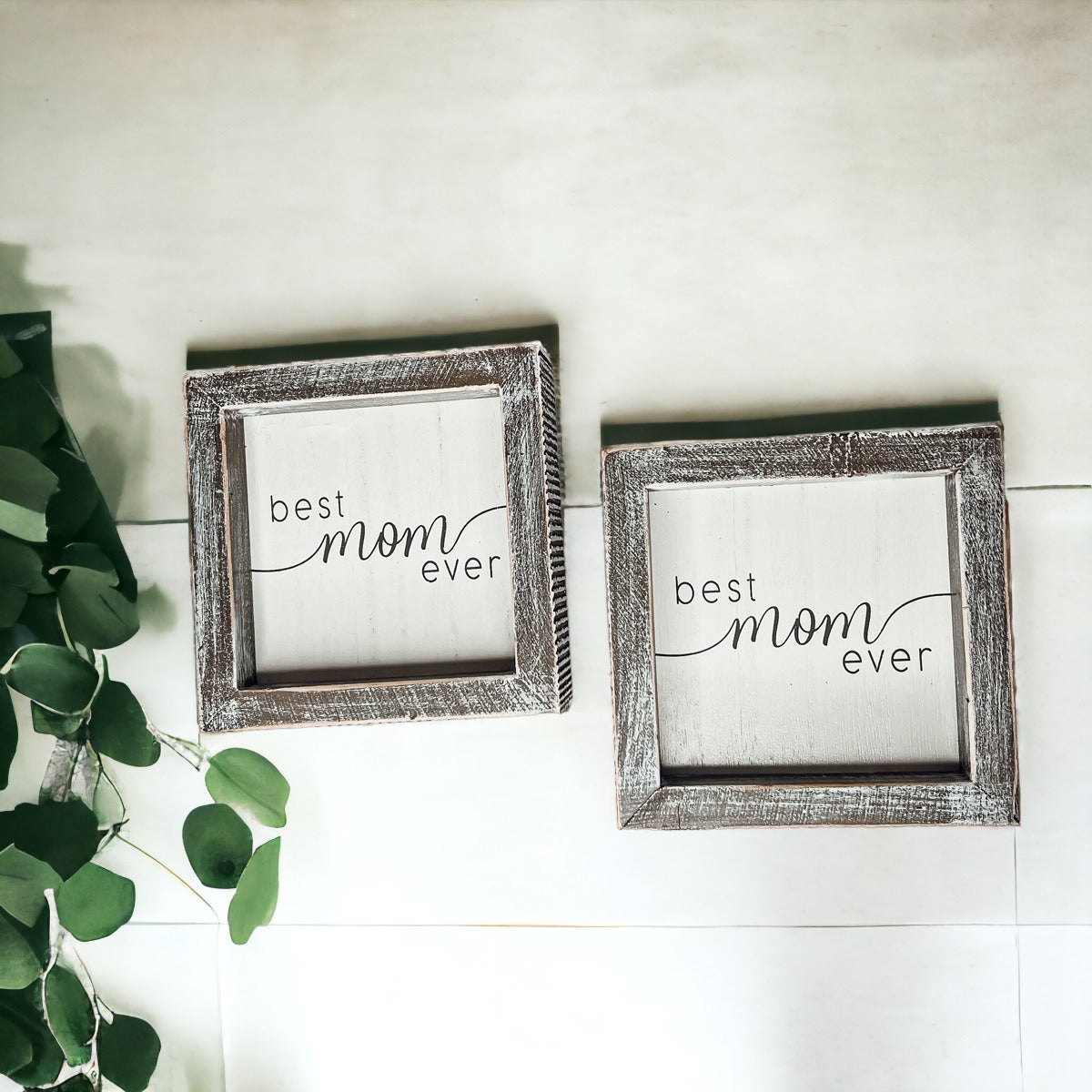 A rustic wooden framed sign displaying the quote 'Best Mom Ever', measuring 5x5x1.5 inches, perfect for home decor.