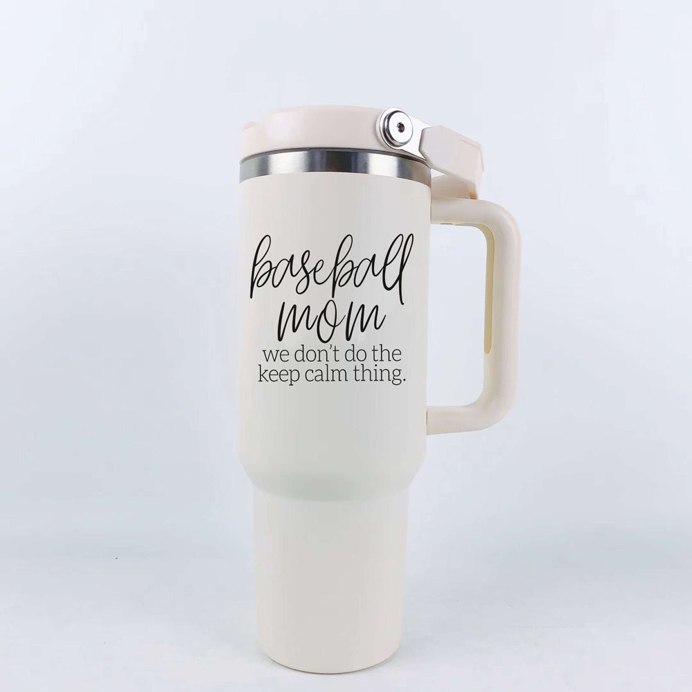 A stylish cream-colored 40oz tumbler with a stainless steel interior, featuring a bold black graphic that reads 'We Don't Do the Keep Calm Thing', designed for baseball moms.