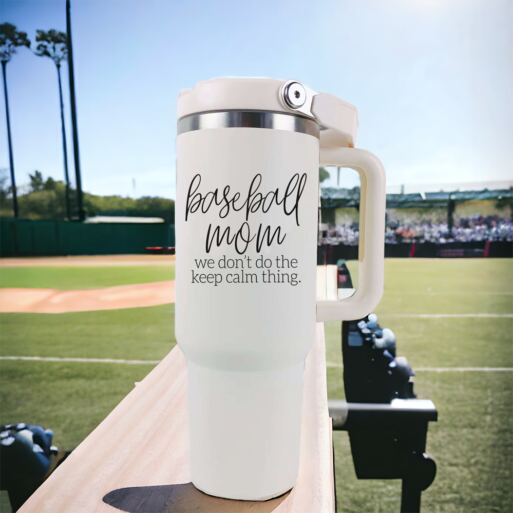 A stylish cream-colored 40oz tumbler with a stainless steel interior, featuring a bold black graphic that reads 'We Don't Do the Keep Calm Thing', designed for baseball moms.