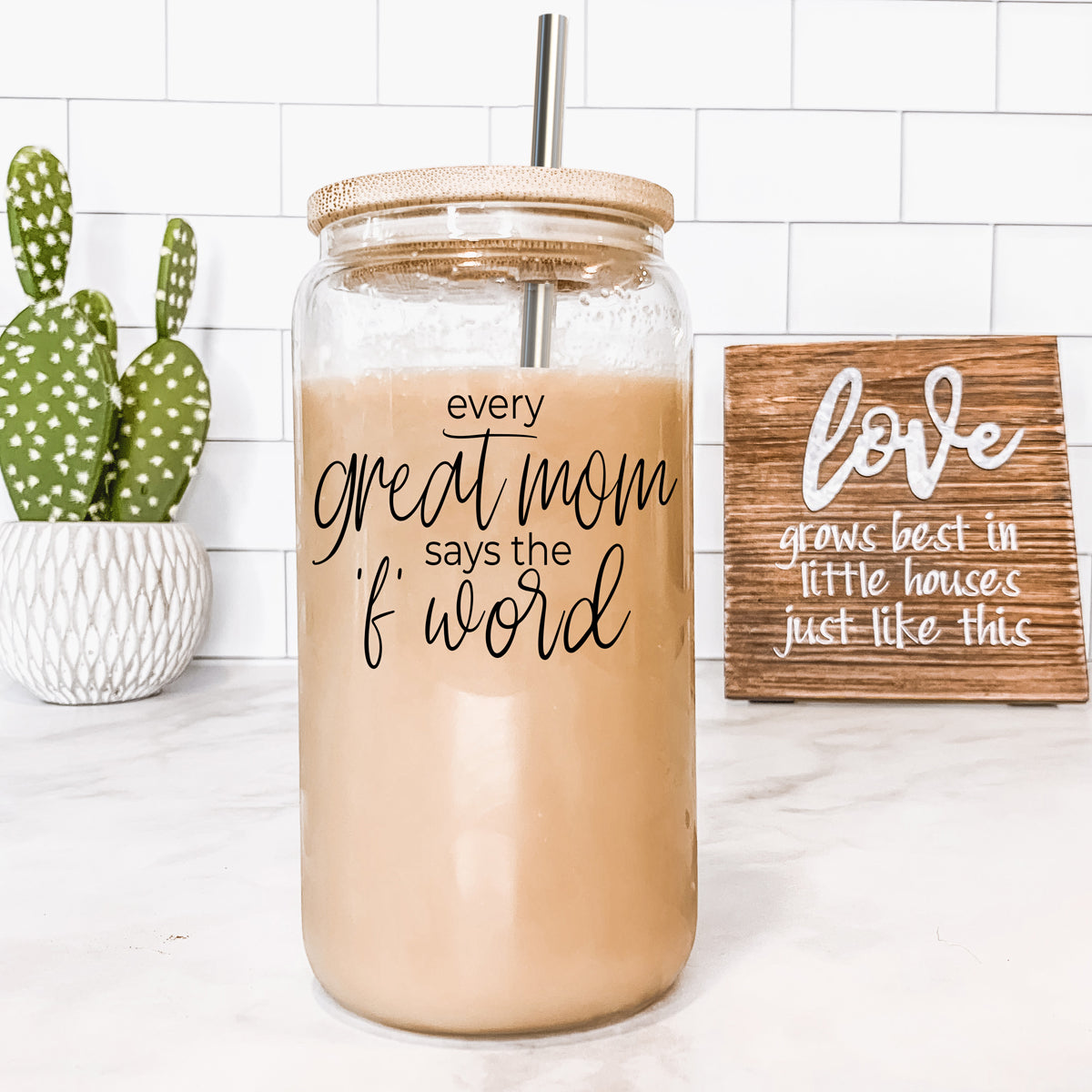 Every Great Mom Set featuring glass drinking cups with bamboo lids, stainless steel straws, and a straw cleaner, perfect for hot and cold beverages.