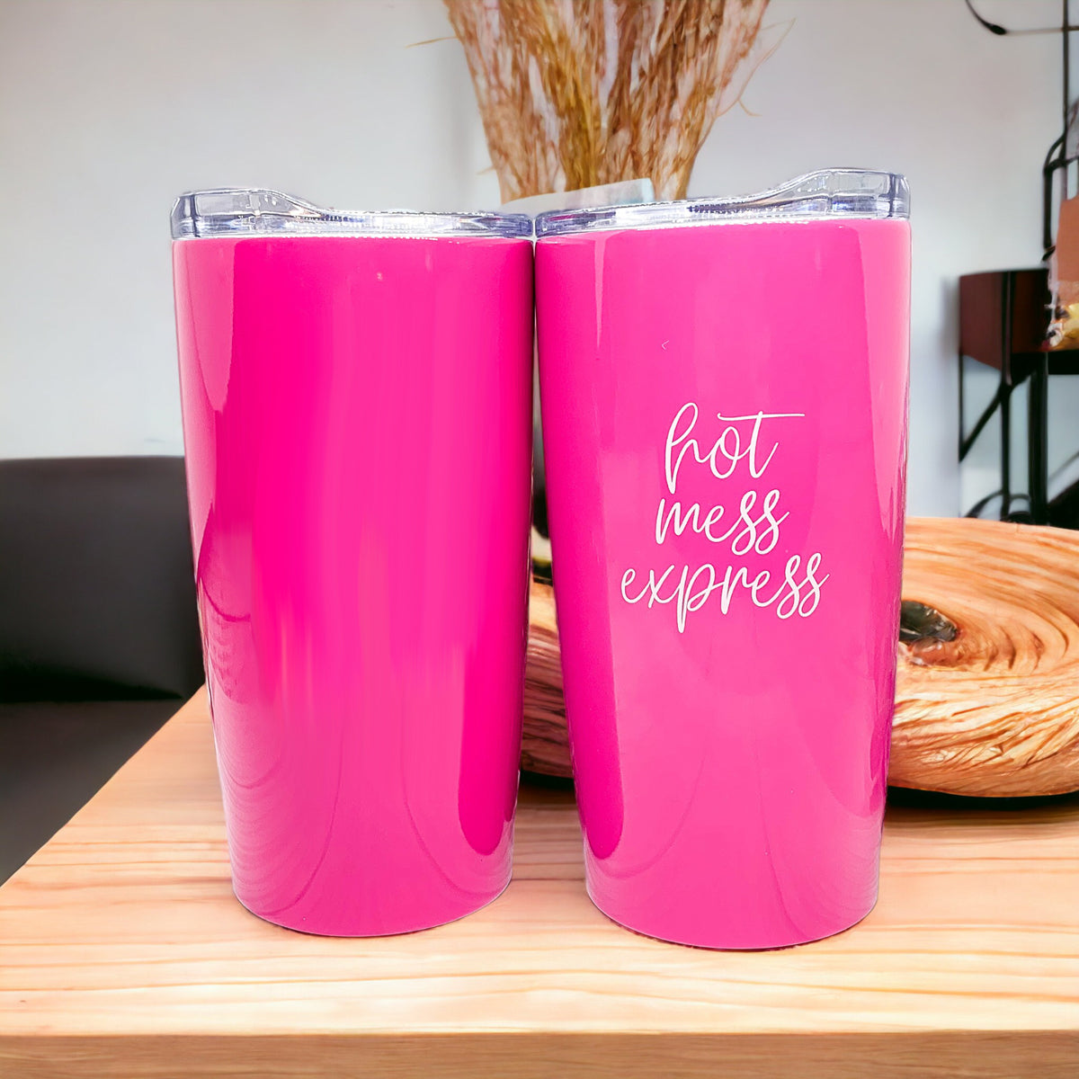 Two pink travel mugs; text reads "hot mess express."