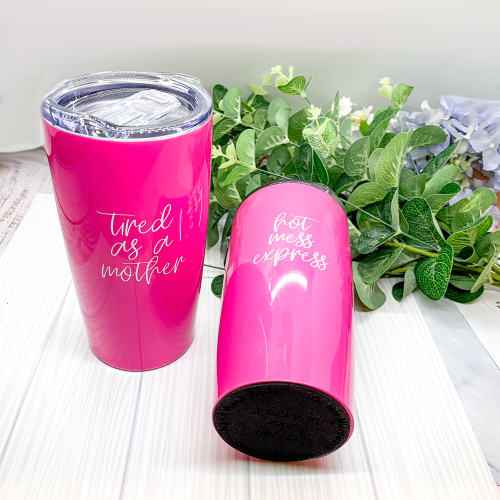 Two pink travel mugs.