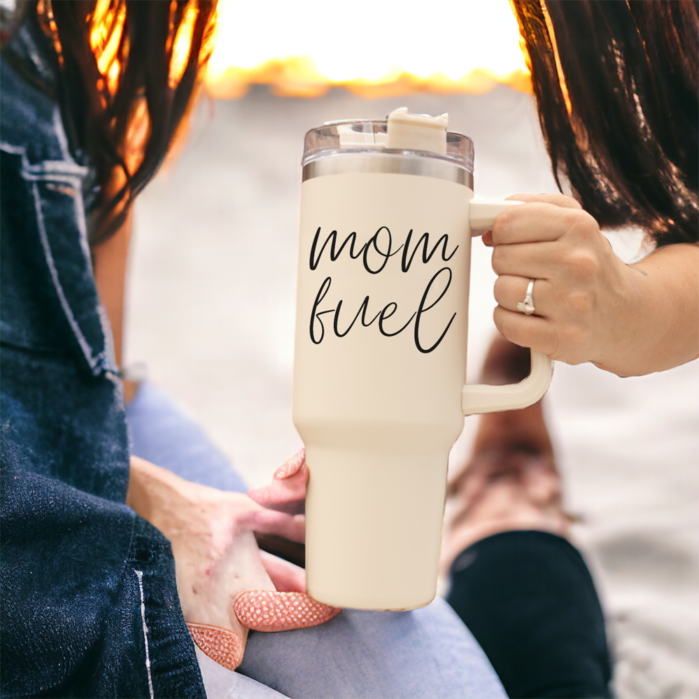 Mom Fuel 40oz tumbler with a cream exterior and black graphic design, showcasing its double insulated structure and versatile 3-in-1 lid.