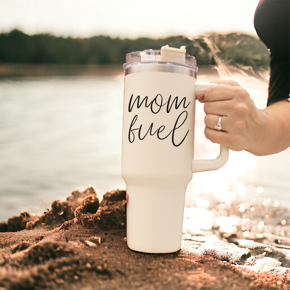 Mom Fuel 40oz tumbler with a cream exterior and black graphic design, showcasing its double insulated structure and versatile 3-in-1 lid.