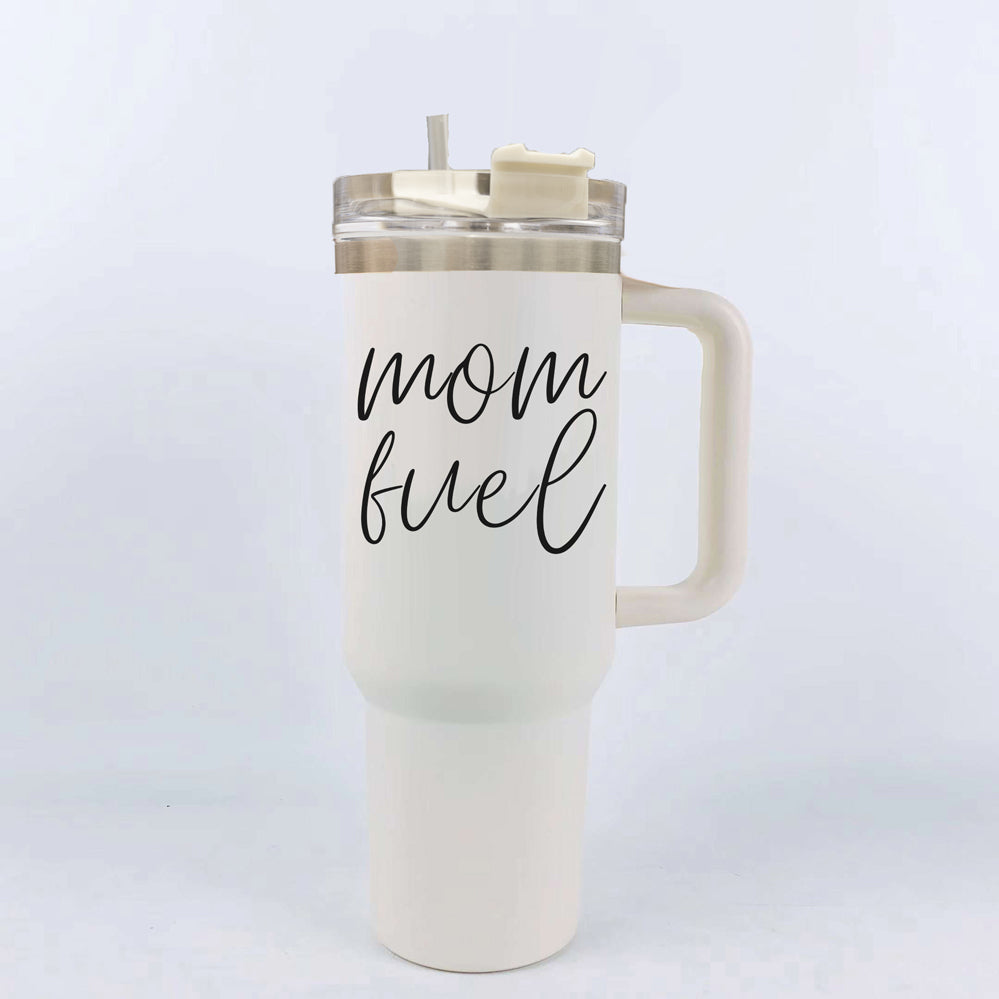 Mom Fuel 40oz tumbler with a cream exterior and black graphic design, showcasing its double insulated structure and versatile 3-in-1 lid.