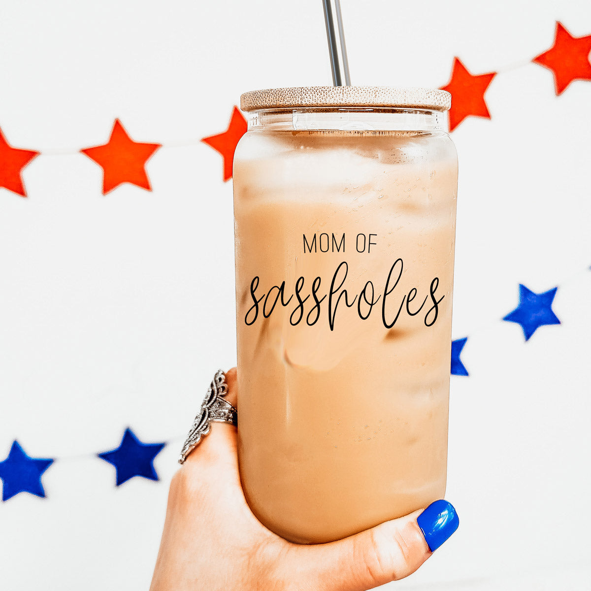 Mom of Sassholes Set featuring stylish glass cups with bamboo lids, stainless steel straws, and a straw cleaner, perfect for sassy moms.