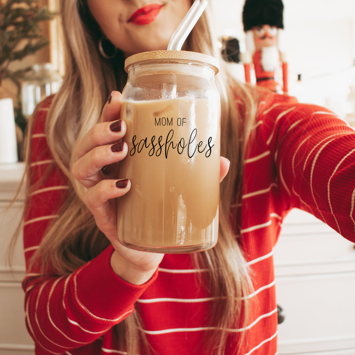 Mom of Sassholes Set featuring stylish glass cups with bamboo lids, stainless steel straws, and a straw cleaner, perfect for sassy moms.